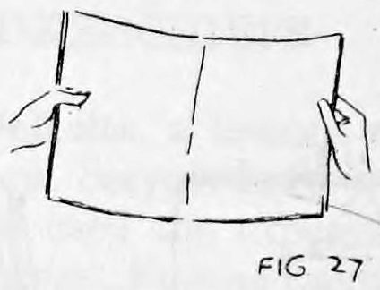 Fig. 27. — The newspaper opened out and held by both hands to show its inside, the hidden silks concealed on the back.