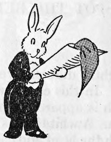 A rabbit in a tuxedo stands on its hind legs holding a large silk cone in both hands, with a dotted silk spilling out of it.
