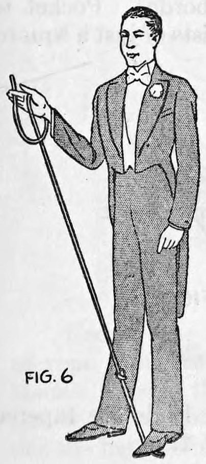 Fig. 6. — A performer in tails and bow tie stands with the knotted end of the rope under his left foot, the loop of rope hanging on his raised right hand.