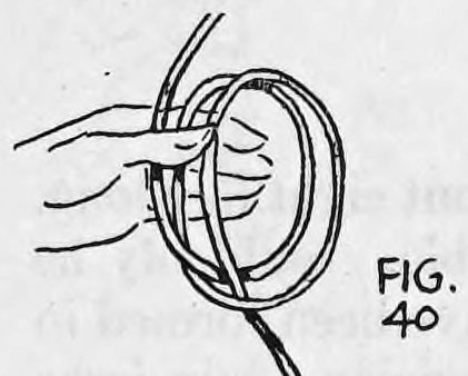 Fig. 40. — A second loop has been made in the rope with the end brought back of the loop, held in the left hand.