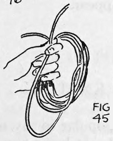 Fig. 45. — All the knots are gathered up in the left hand, whose thumb and first finger also grasp the right hand end of the rope.