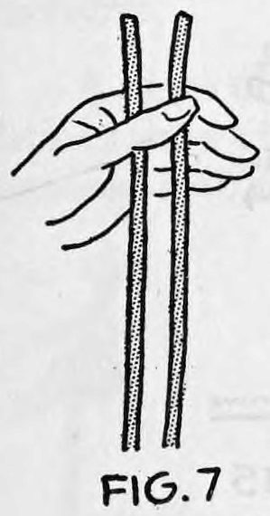 Fig. 7. — Two ropes hang down side by side from the left hand, the thumb screening the loop of the short piece.