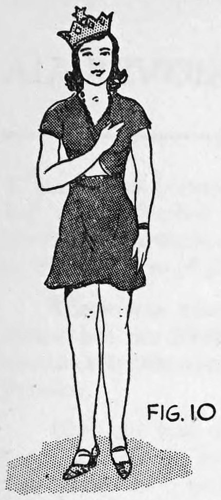 Fig. 10. — The girl assistant standing full length, dressed as the Queen with a small crown, one hand held to her chest, with the hand-lettered label Fig. 10 beside her.