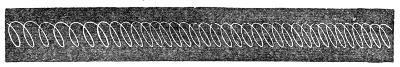 The steady circle drawn out sideways by turning the mirror of the fork T — a luminous scroll of even loops stretching right across the screen.