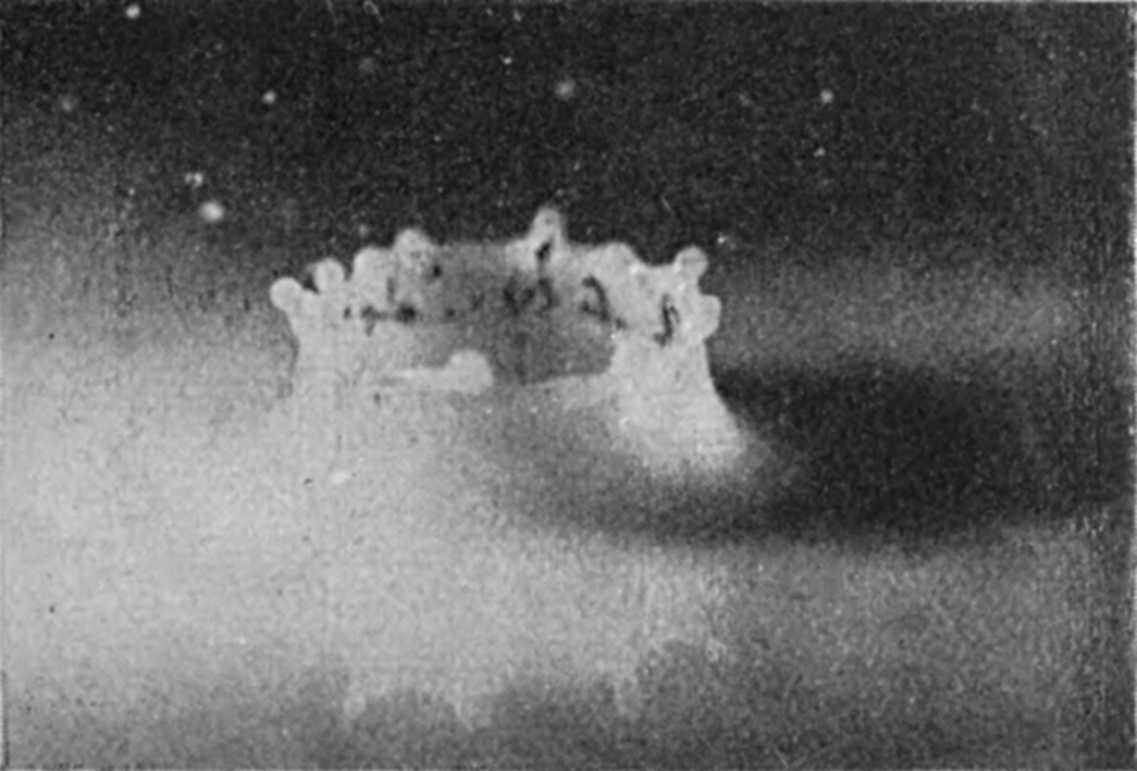 5 0·018 sec. — The walls of the crater growing thicker and the jets shortening into rounded lobes, with dark flecks of lamp-black on the inside wall.