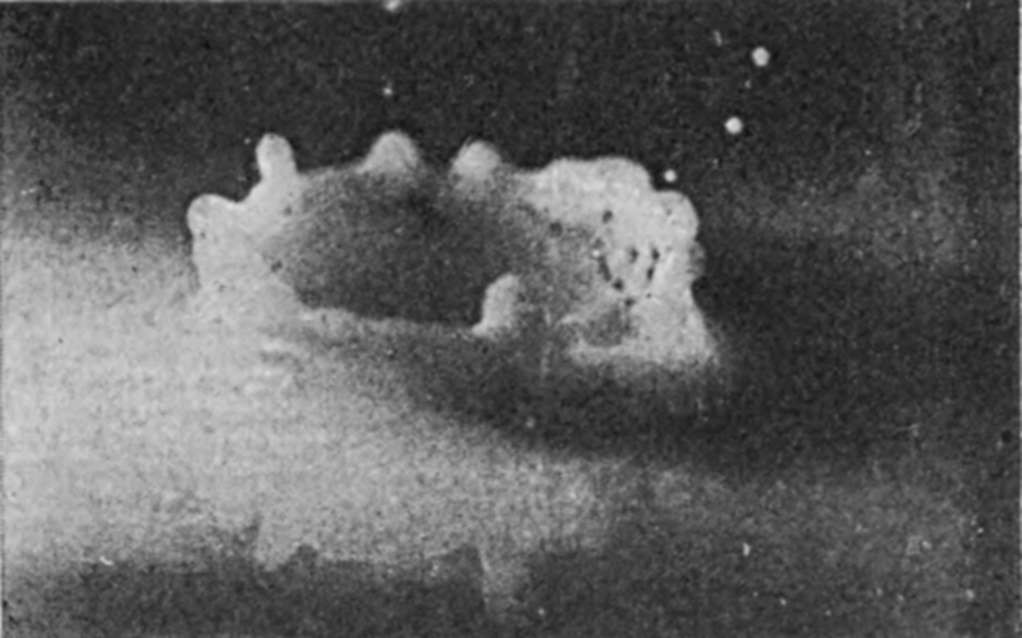 6 0·031 sec. — The crater lower and heavier, its rim a ring of uneven lobes, with lamp-black streaks inside and a few stray drops above.