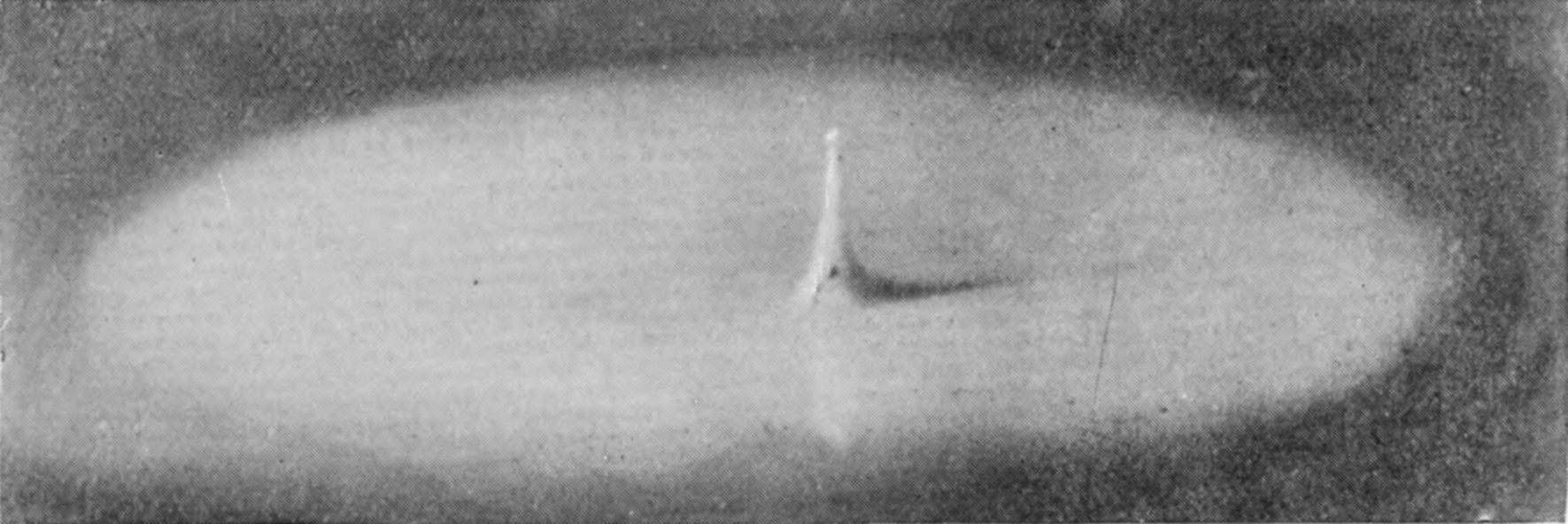 21 a 0·242 sec. — The secondary column has risen into a slender needle, still very thin, with its shadow curving across the surface.
