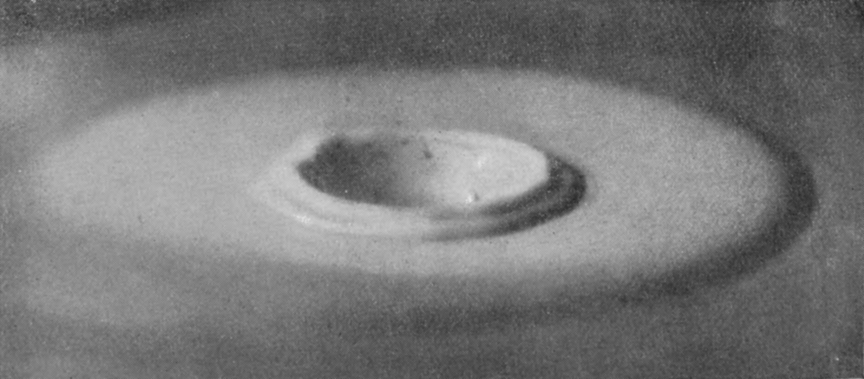 21 b 0·244 sec. — The rim of the secondary crater spreading outwards, with a thin second ripple running on ahead of it.