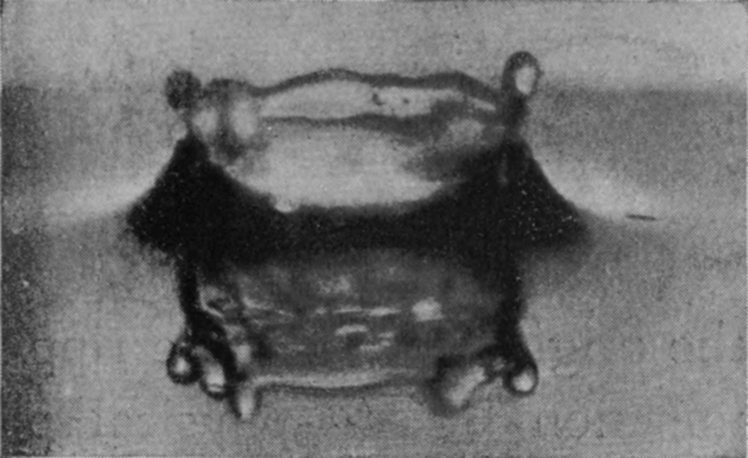 5 0·026 sec. — The crater is subsiding into a low, broad basin, its rim still wavy and beaded with swellings, and its reflection lying close beneath it.