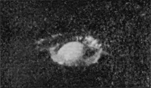 1 0·002 sec. — The milk drop has just entered the water and lies as a bright ball at the bottom of a shallow hole, with a faint ragged rim of light around it.