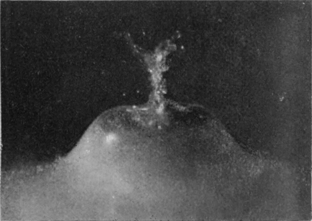 5 0·033 sec. — The crater has closed into a delicate bubble, its summit twisted into a small frothy spout where the walls have met.