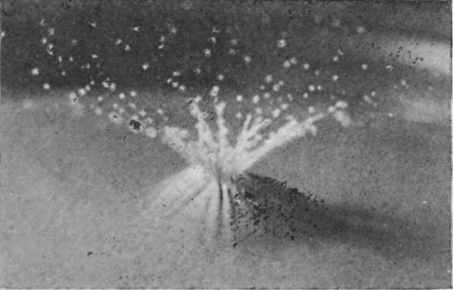 3 0·013 sec. — The sheath has closed right over the sphere, deeply furrowed, and fine jets and spray shoot up from the point where it met.