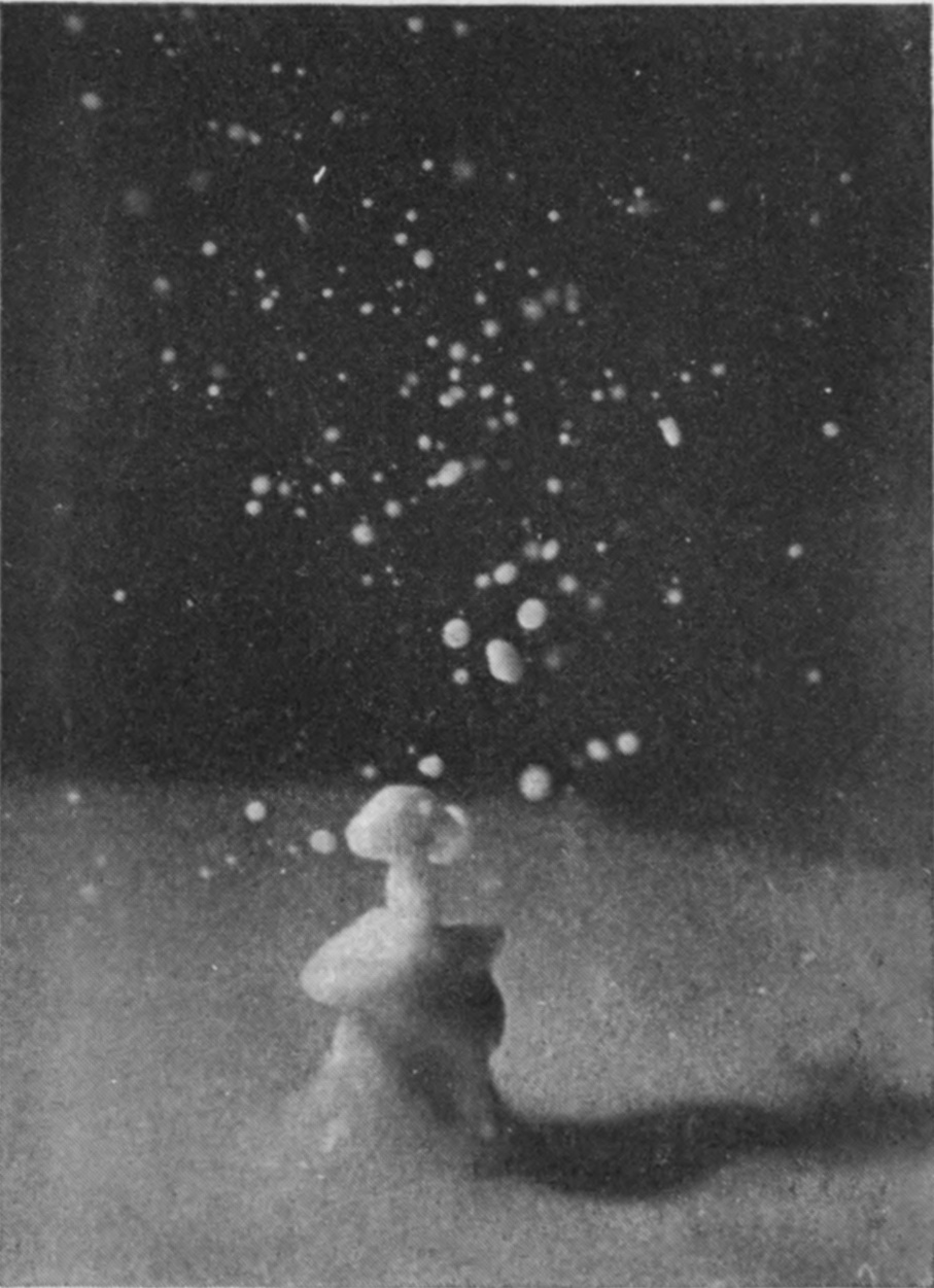 5 0·039 sec. — The small column has a rounded head and a collar partway down, with a cloud of drops above it.